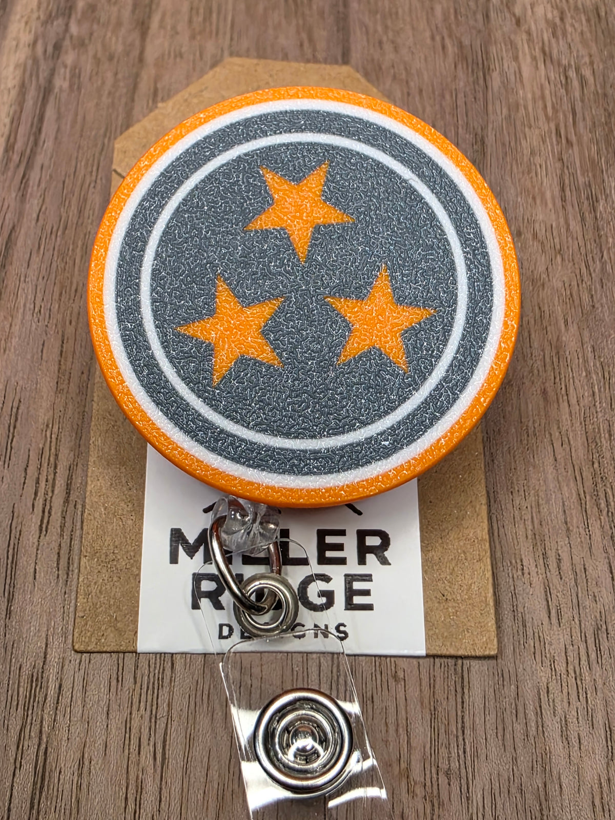 Smokey grey Tristar badge reel
