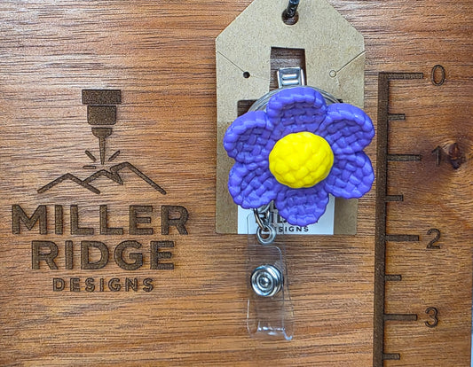 Purple daisy badge reel