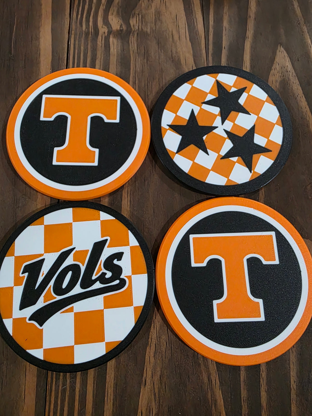 Power T, checkered Vols and Tri-star coasters