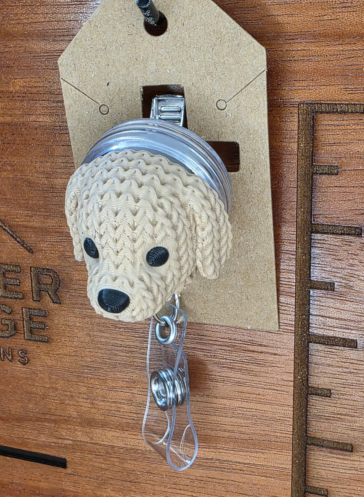 Golden retriever badge reel