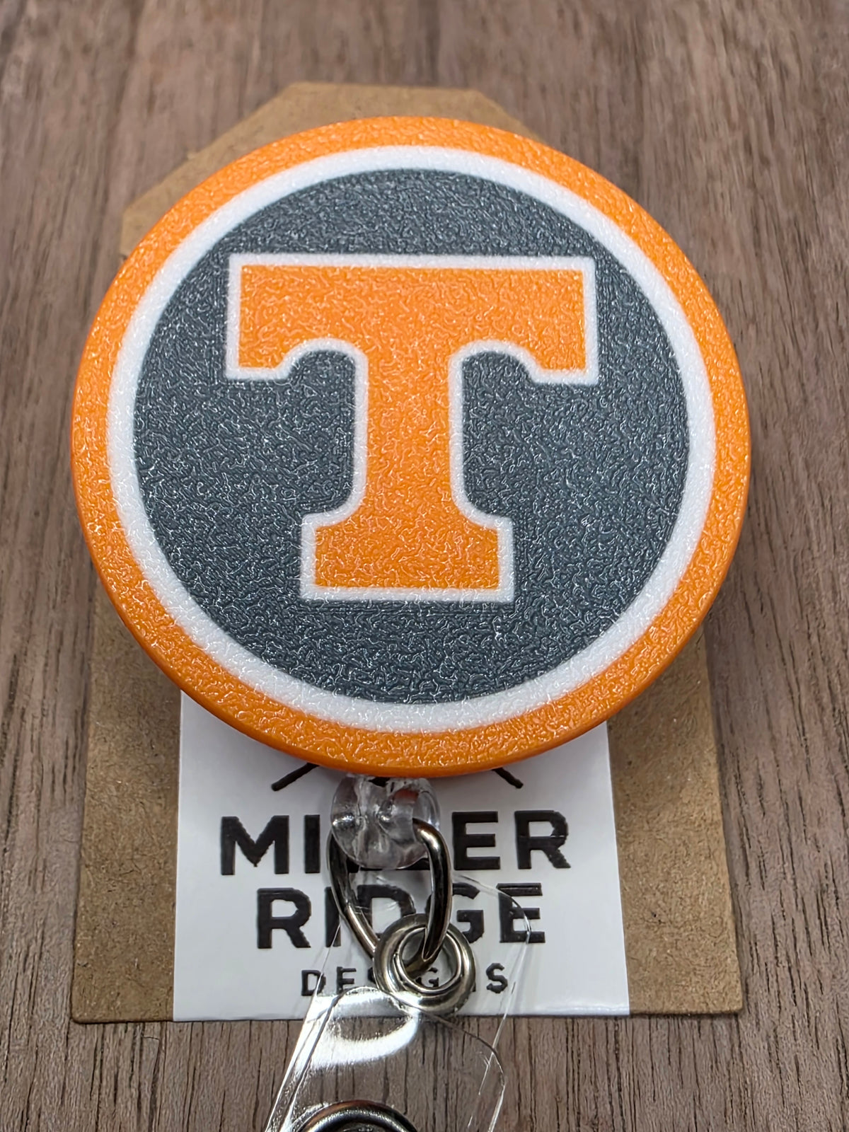 Smokey grey Power T badge reel