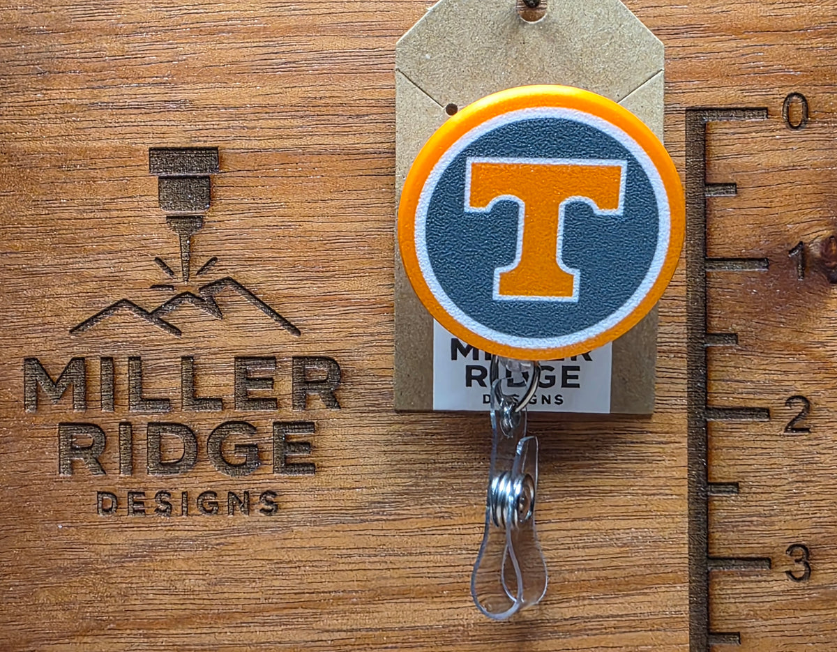 Smokey grey Power T badge reel