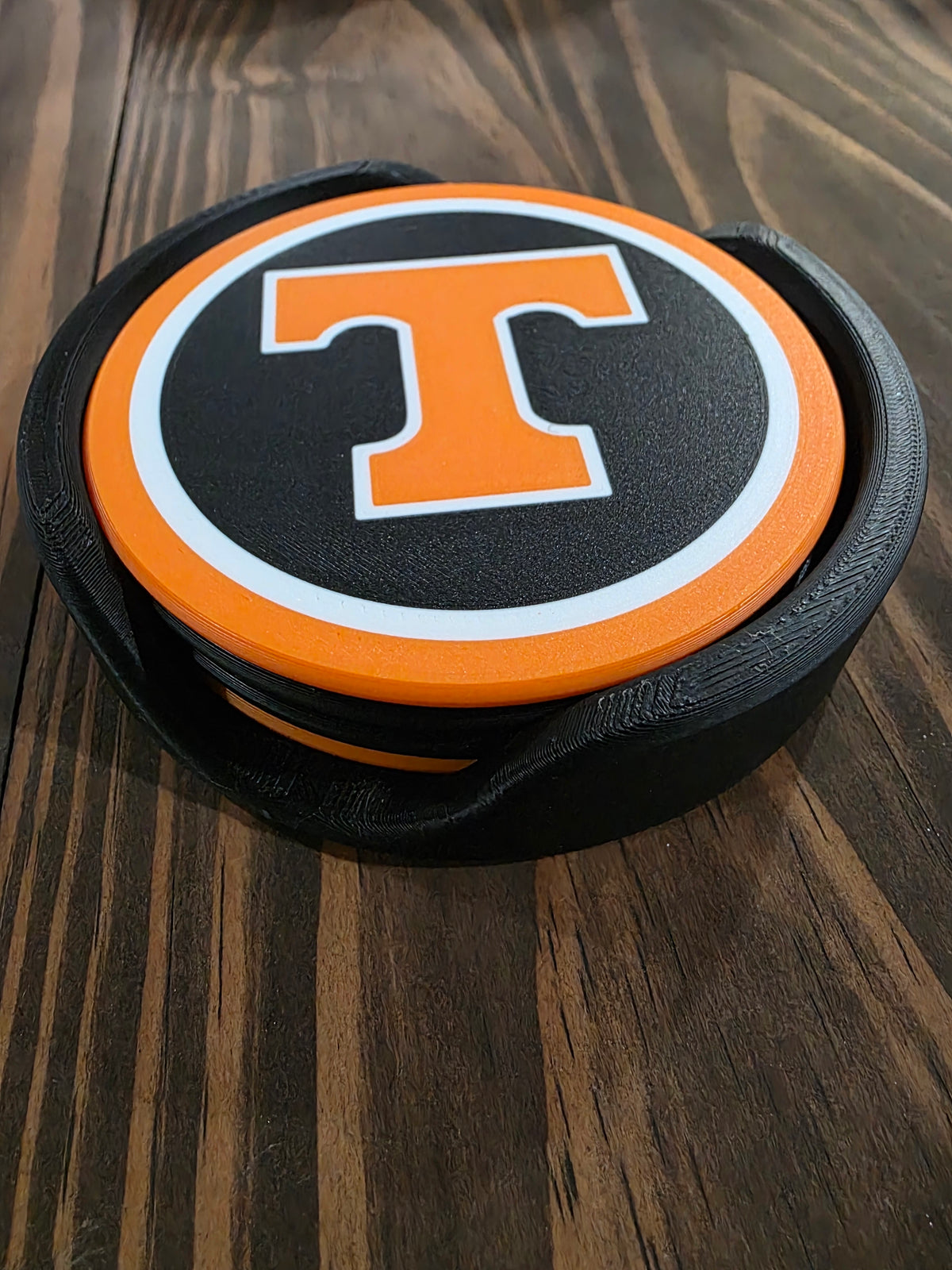 Power T, checkered Vols and Tri-star coasters