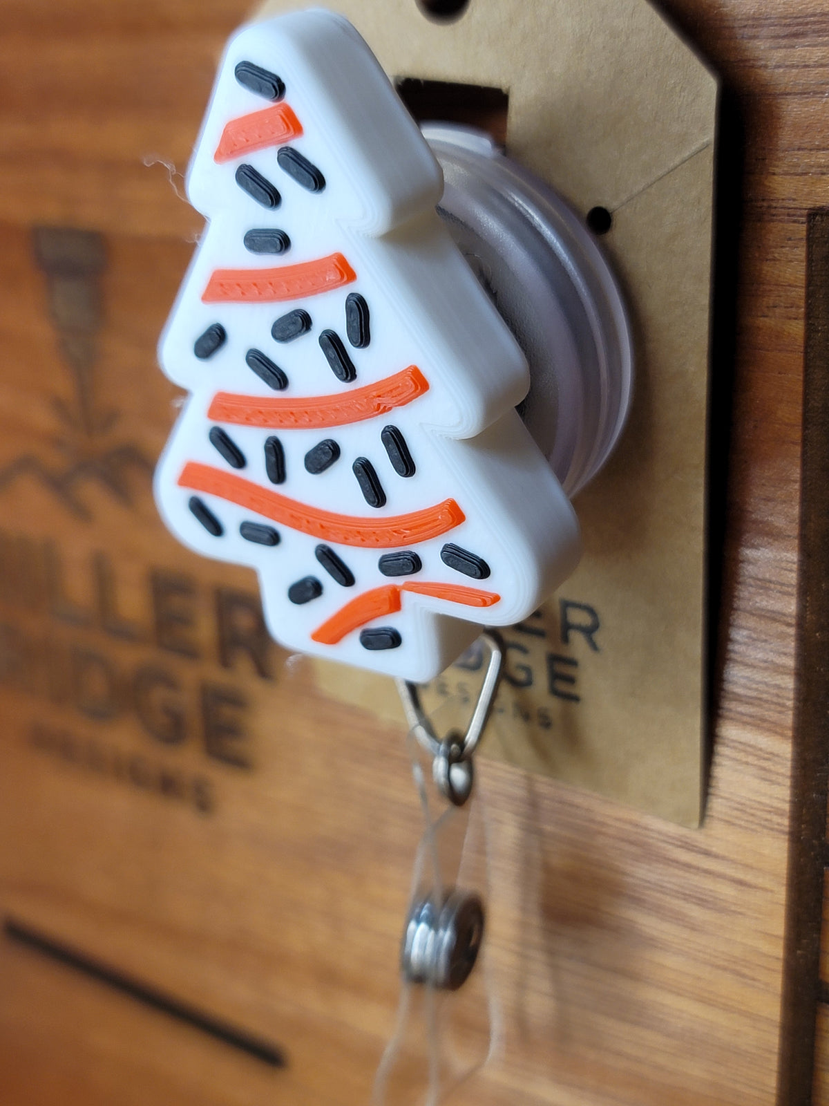 Christmas tree treat badge reel (black sprinkles)