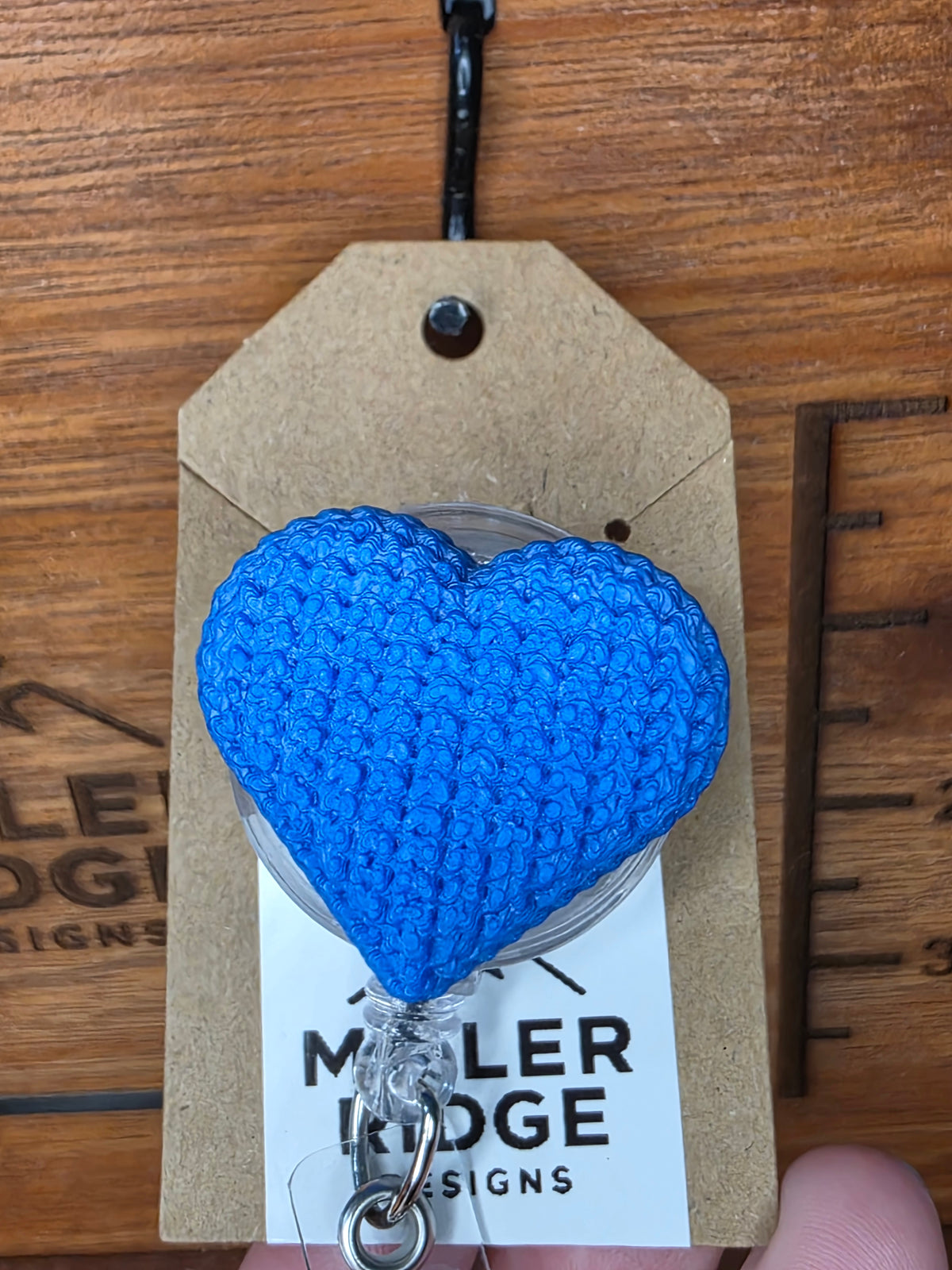Royal blue knitted heart badge reel